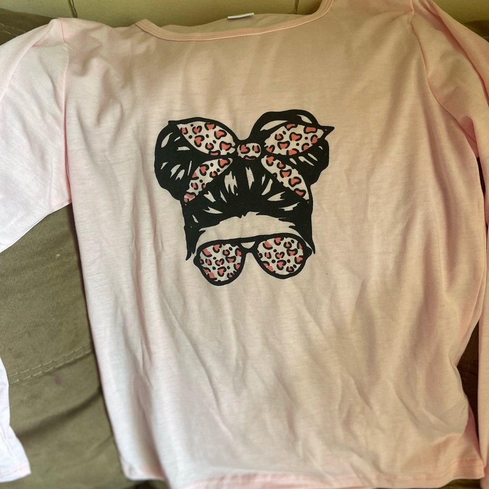 Pink shirt and jeans
